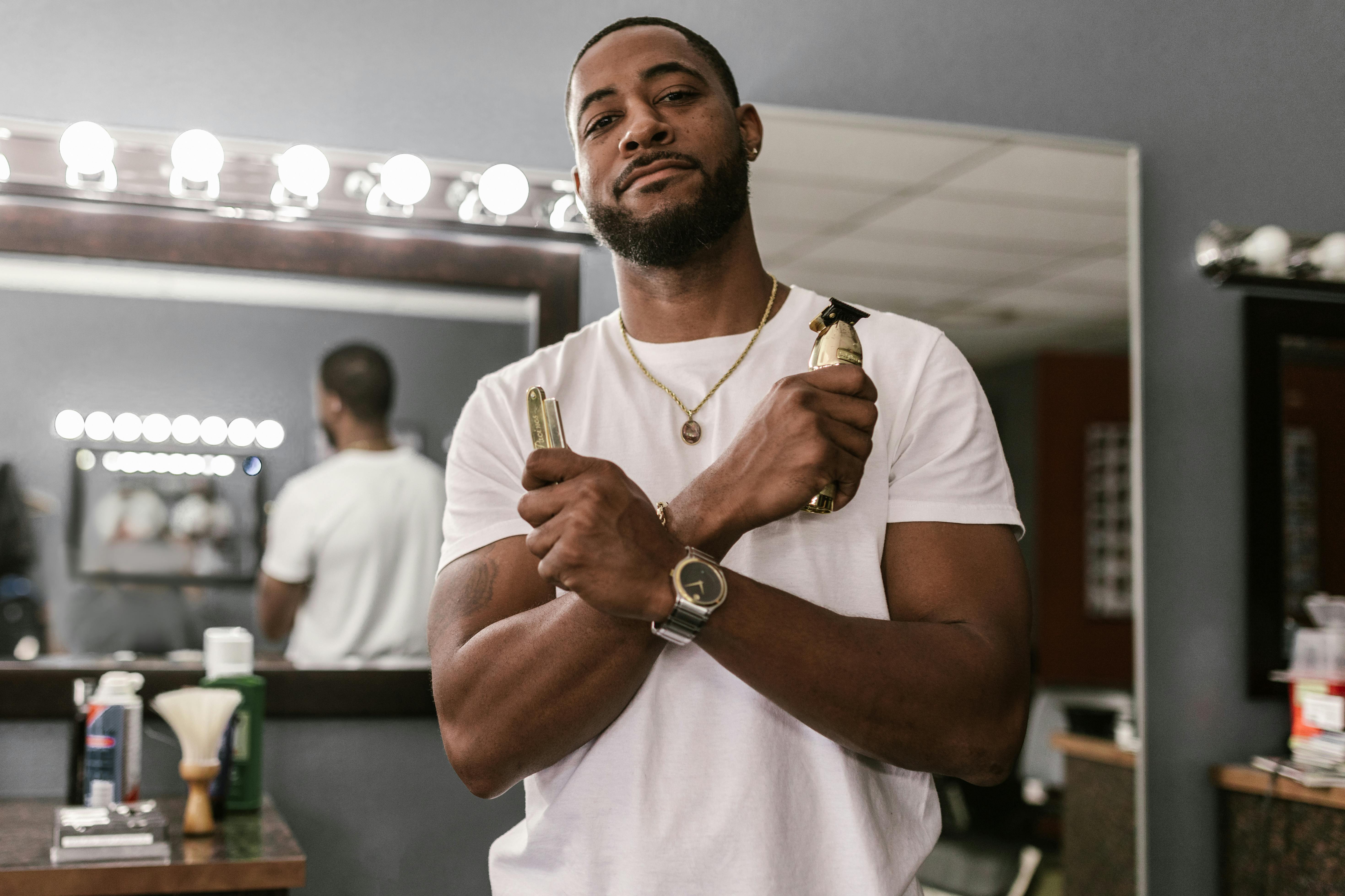 Barber finishing a clean fade haircut